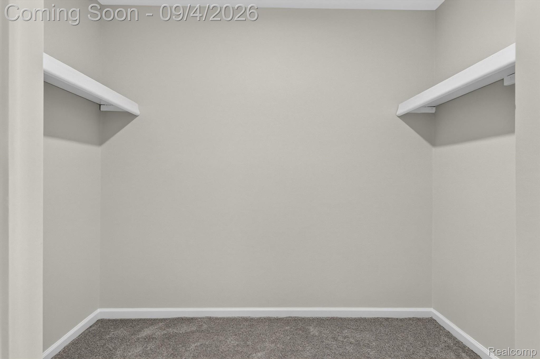 43182 Applewood Road Canton, MI 48188 - Photo 19 of 36 Carpeted interior with light-toned walls and built-in shelving