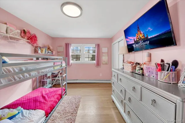 a bedroom with furniture and a bed