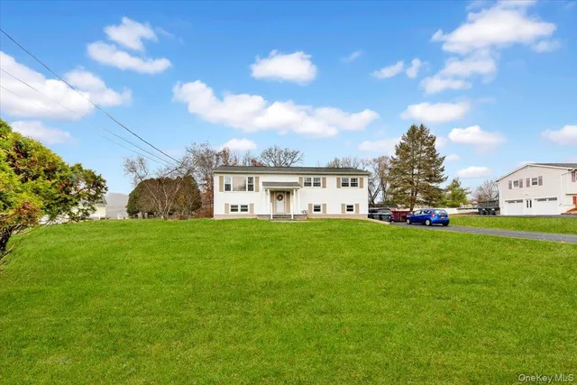 a view of a house with a big yard
