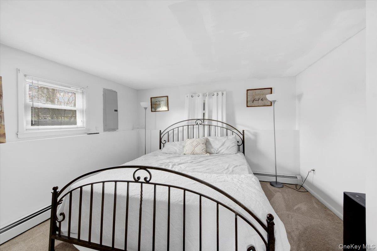 10 Scott Drive Middletown, NY 10941 - Photo 32 of 33 a bedroom with a bed and a window