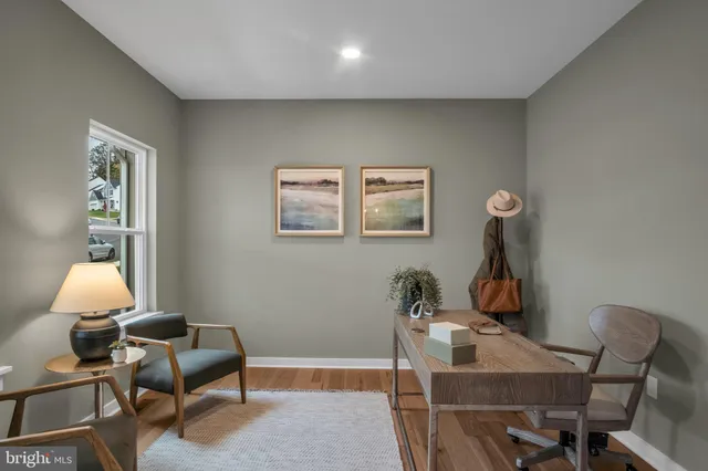 a view of a workspace with furniture