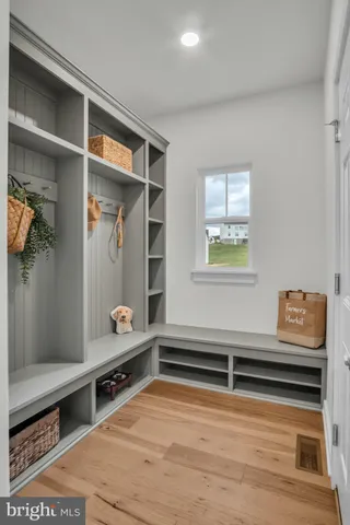 a room with gym equipment and a window