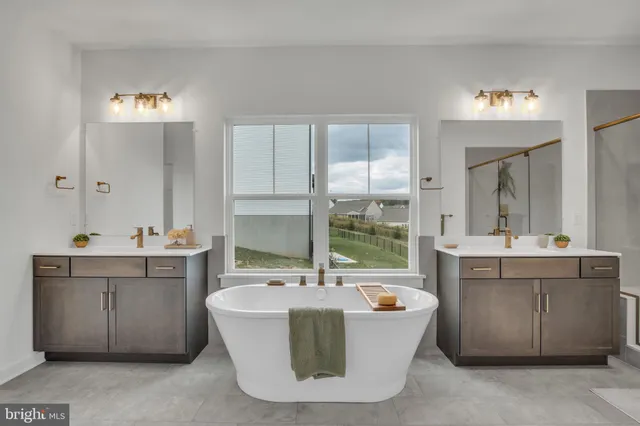 a living room with a window and a table