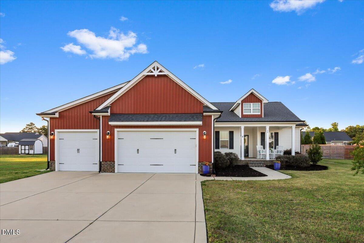88 Heath Road Lillington, NC 27546 - Photo 43 of 54 a front view of a house with a yard