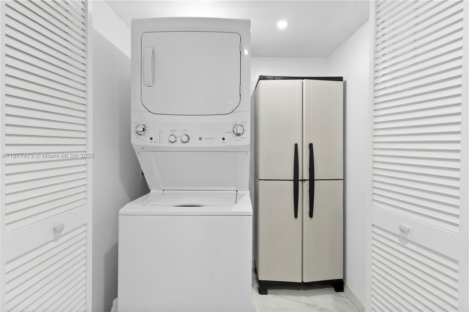 200 Southeast 15th Road, Unit 6F Miami, FL 33129 - Photo 33 of 38 a utility room with dryer and washer