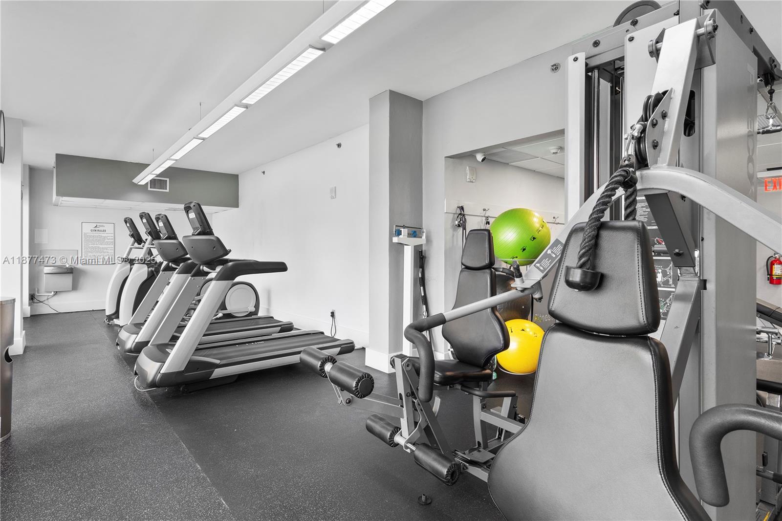 200 Southeast 15th Road, Unit 6F Miami, FL 33129 - Photo 35 of 38 a view of a room with gym equipment
