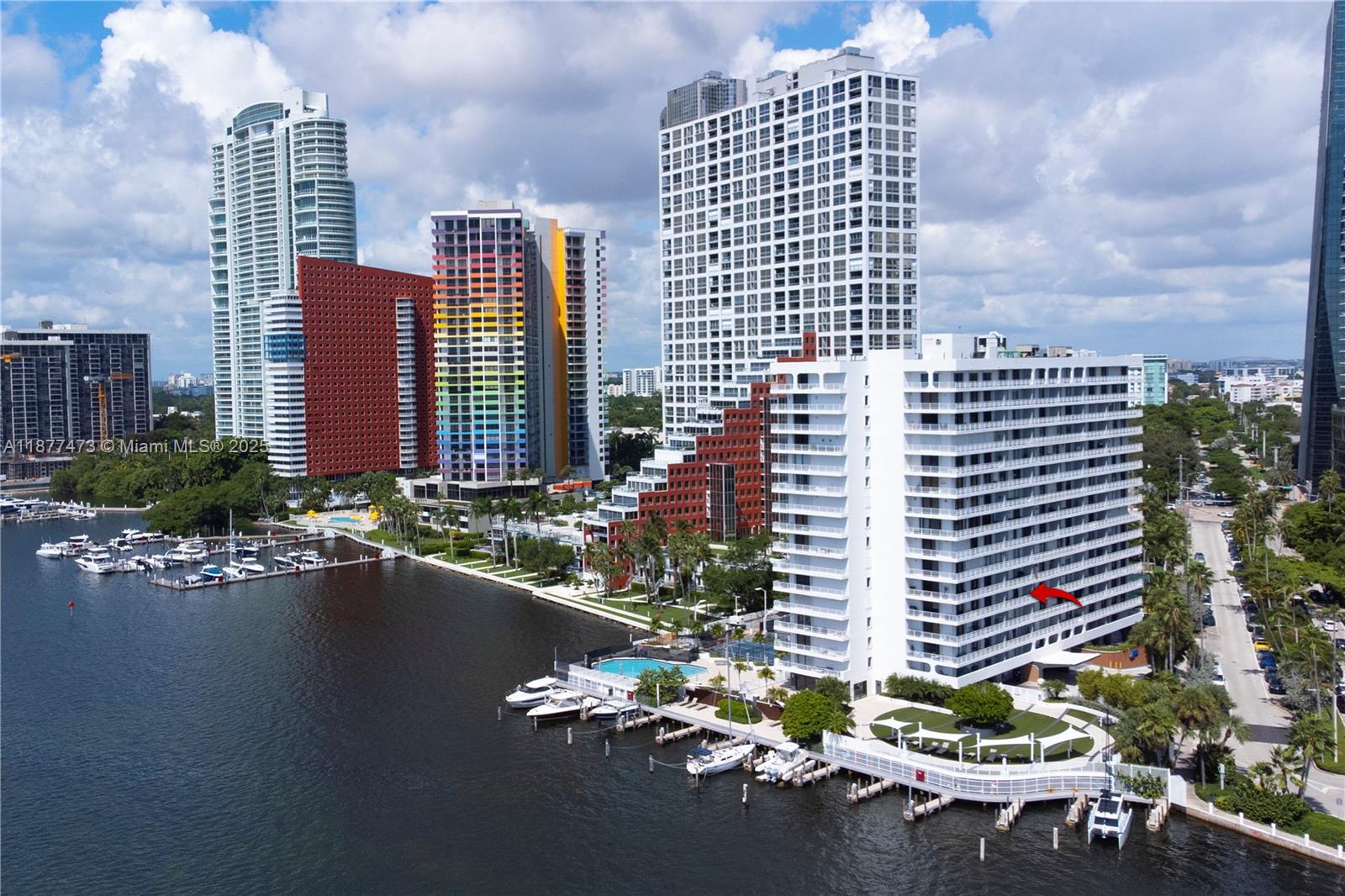 200 Southeast 15th Road, Unit 6F Miami, FL 33129 - Photo 6 of 38 a front view of a building with yard