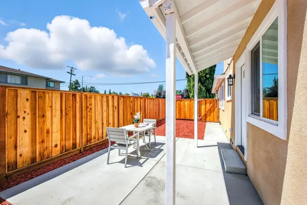 a garden view with a seating space