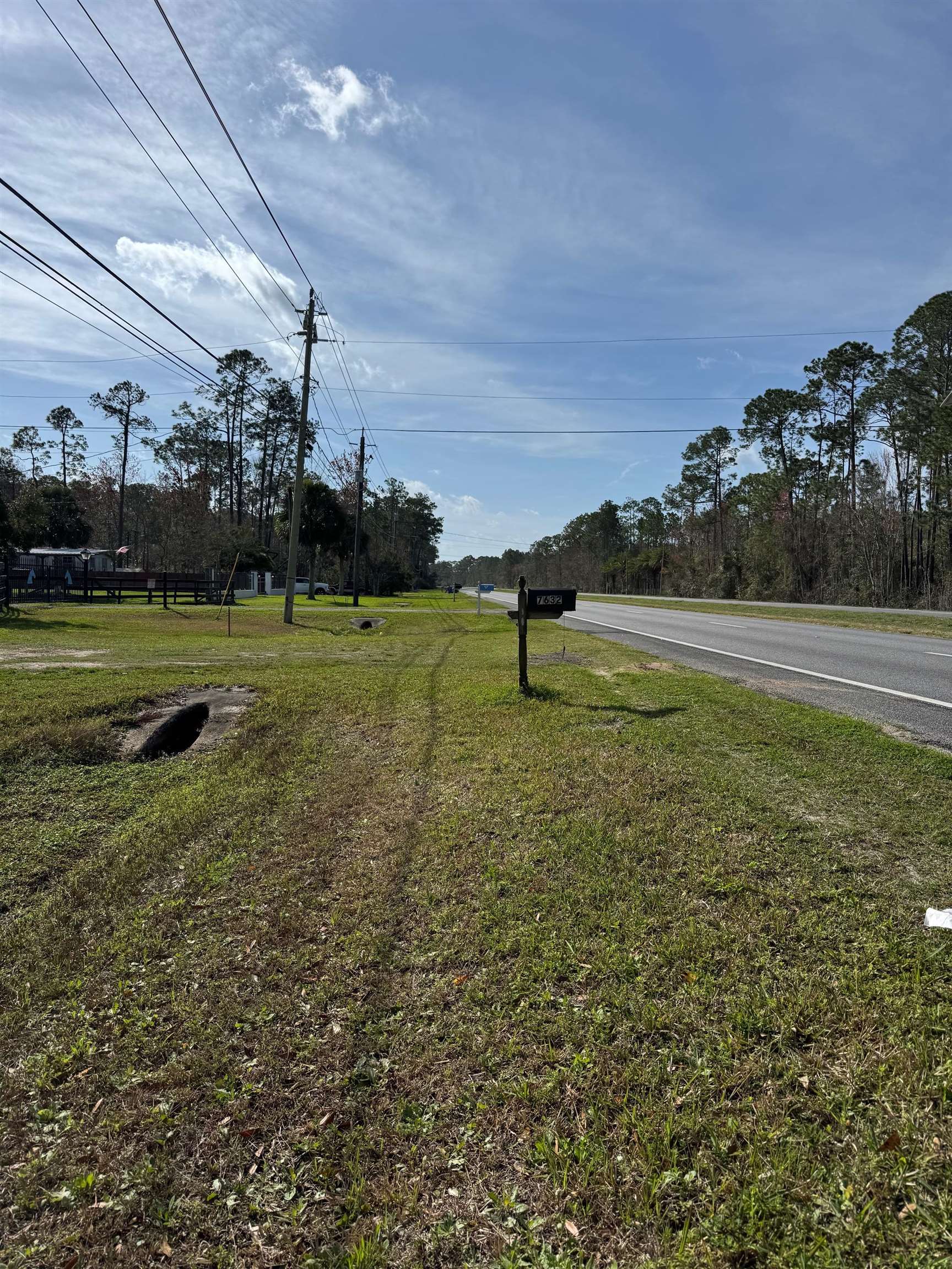 7628 Highway 1 St. Augustine, FL 32086 - Photo 5 of 7 a view of outdoor space with deck and yard