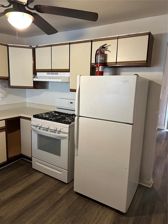 1109 Willow Avenue Sanford, FL 32771 - Photo 3 of 9 a kitchen with a refrigerator and a stove