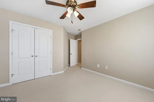 a bathroom with a sink toilet double vanity and shower