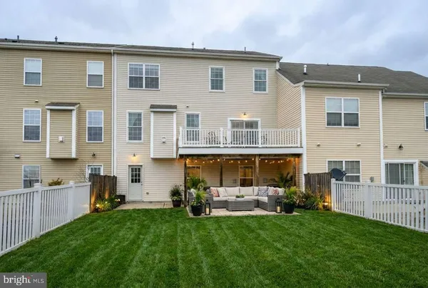 a view of a swimming pool with a lounge chair