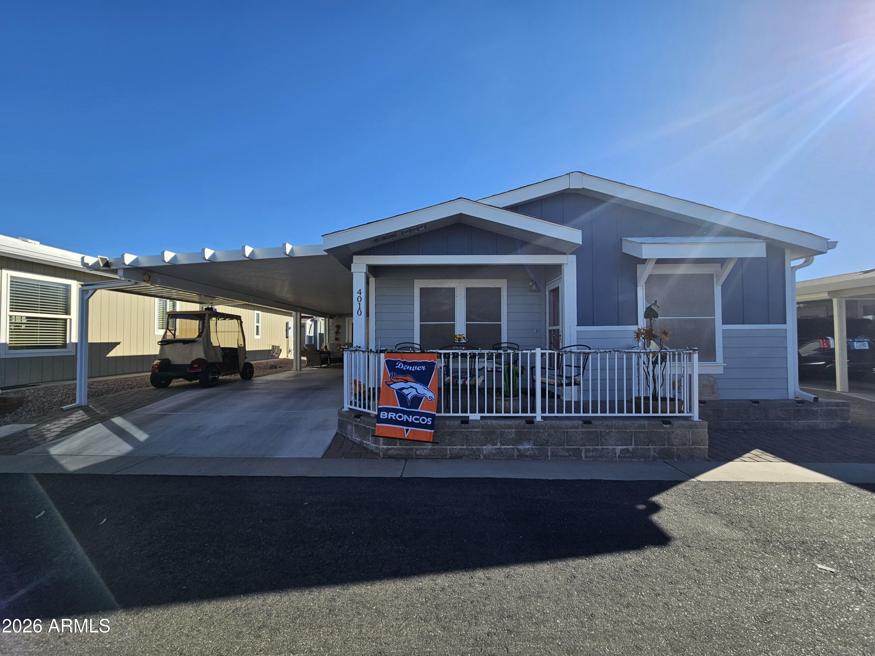 650 North Hawes Road, Unit 4010 Mesa, AZ 85207 - Photo 25 of 35 a view of a house with a deck