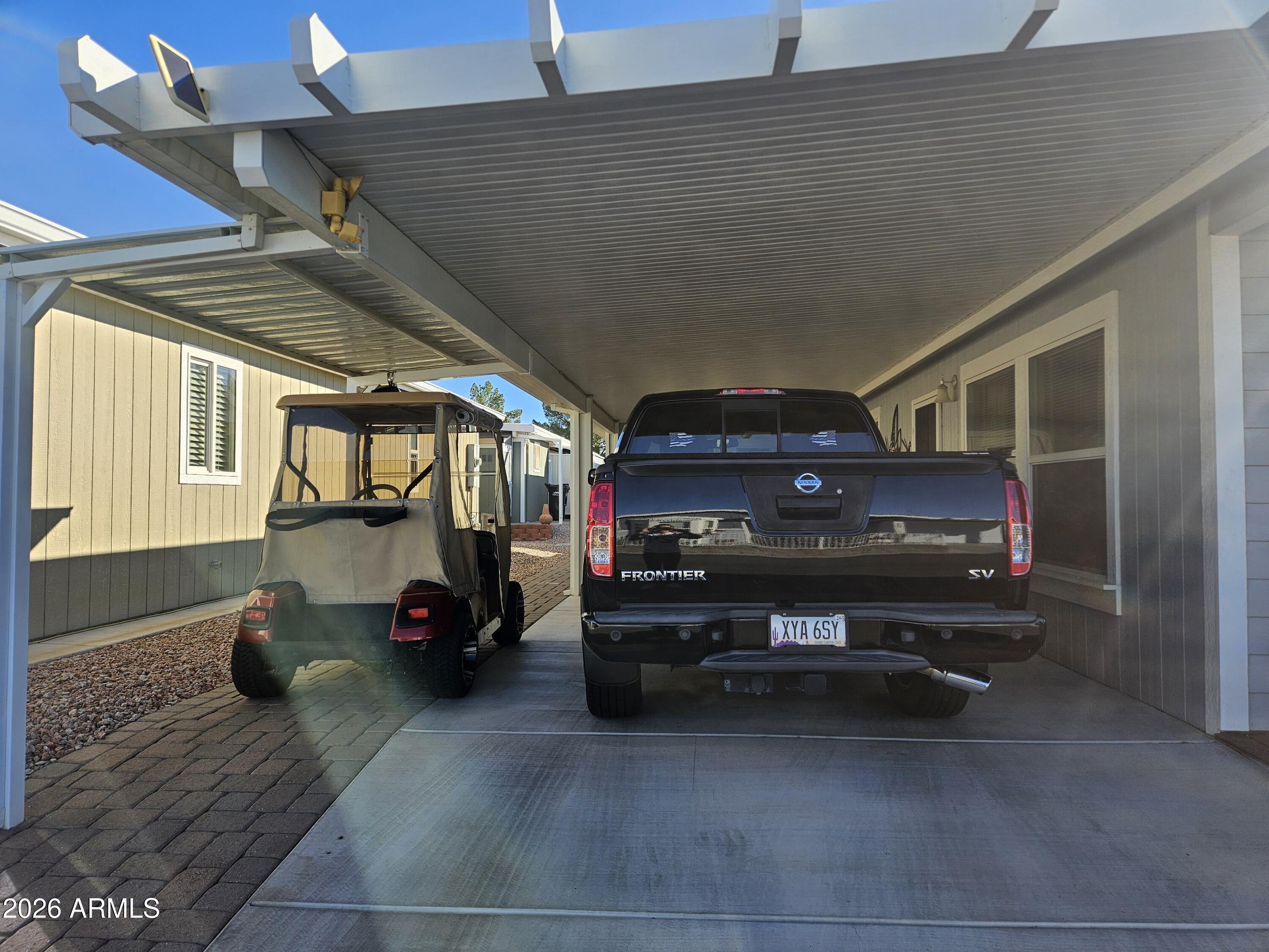 650 North Hawes Road, Unit 4010 Mesa, AZ 85207 - Photo 8 of 35 a view of car parking