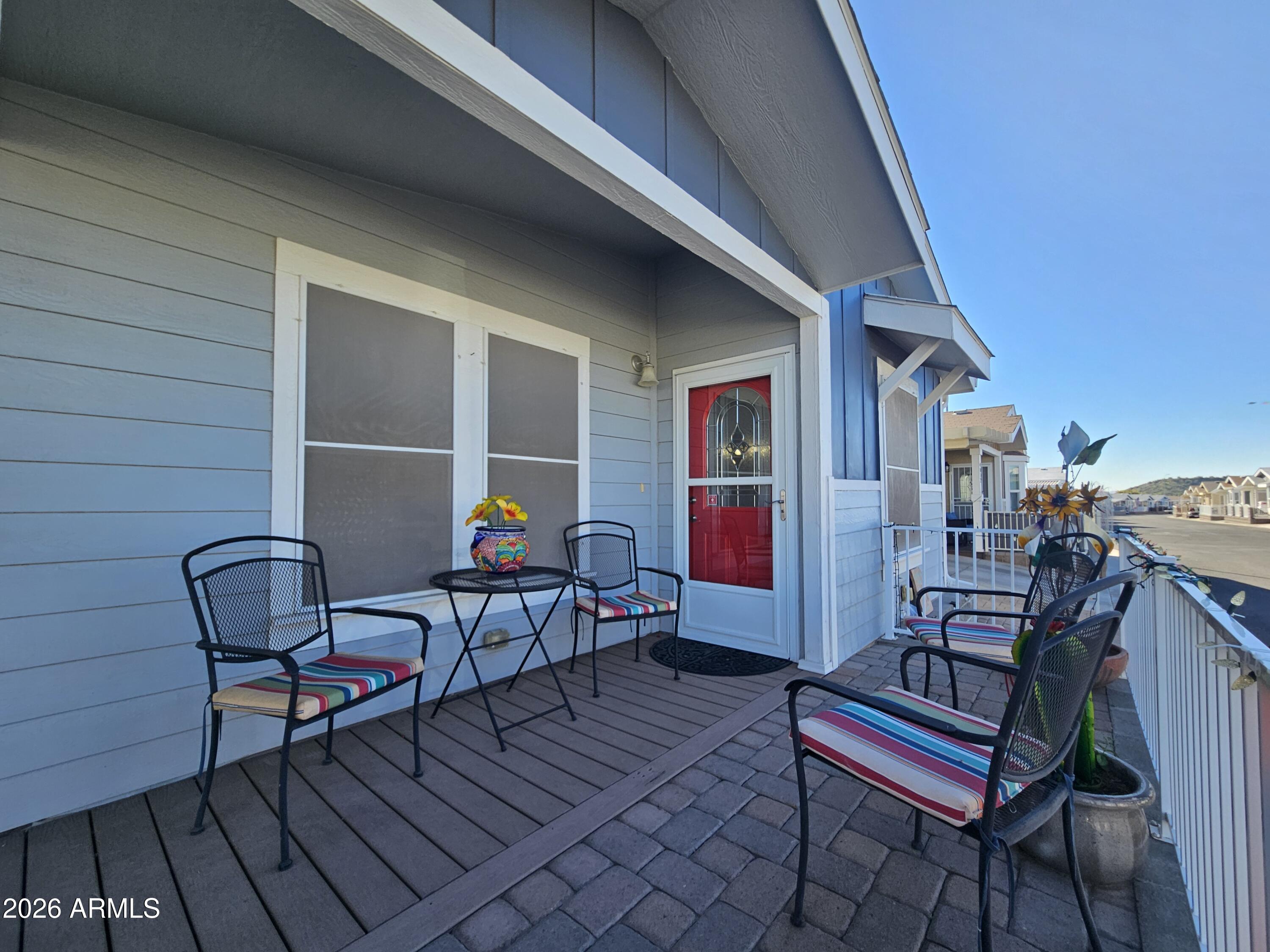 650 North Hawes Road, Unit 4010 Mesa, AZ 85207 - Photo 9 of 35 a view of a chairs in balcony