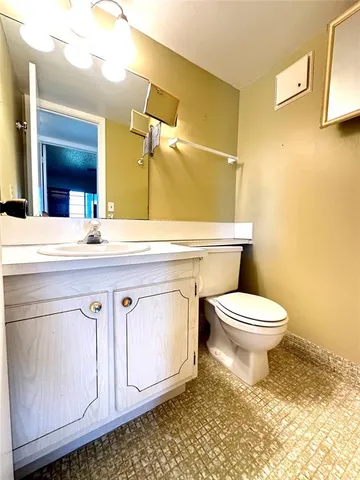 a bathroom with a bath tub with a shower