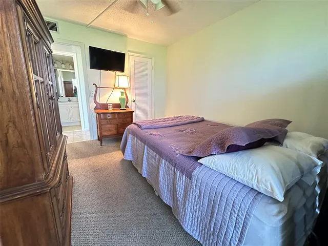 a view of an entryway with table and chair