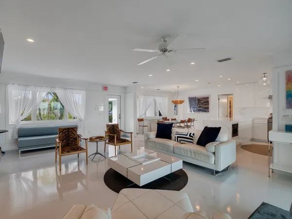 a living room with furniture and a couch