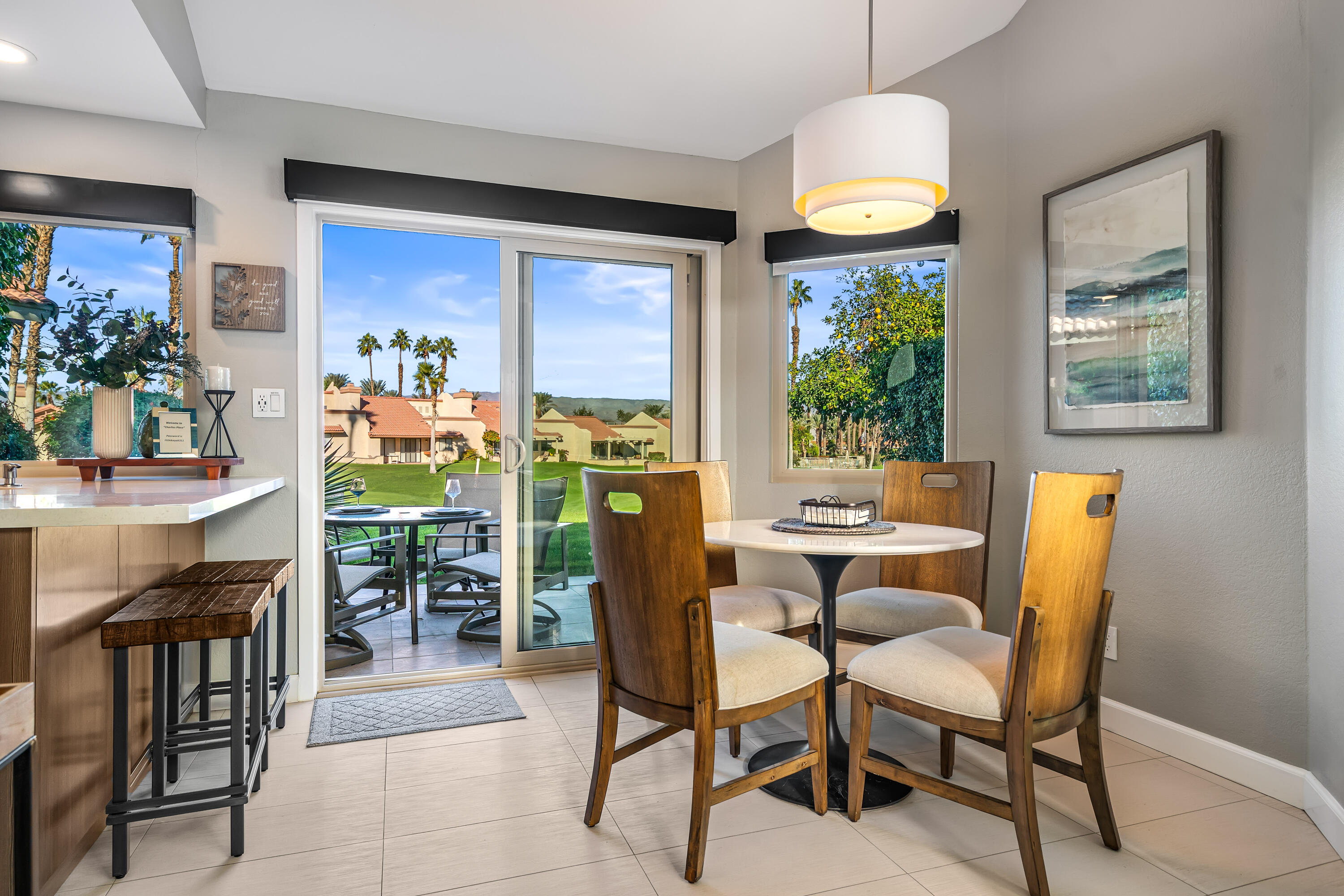 76632 Morocco Road Palm Desert, CA 92211 - Photo 11 of 38 a dining room with furniture and window