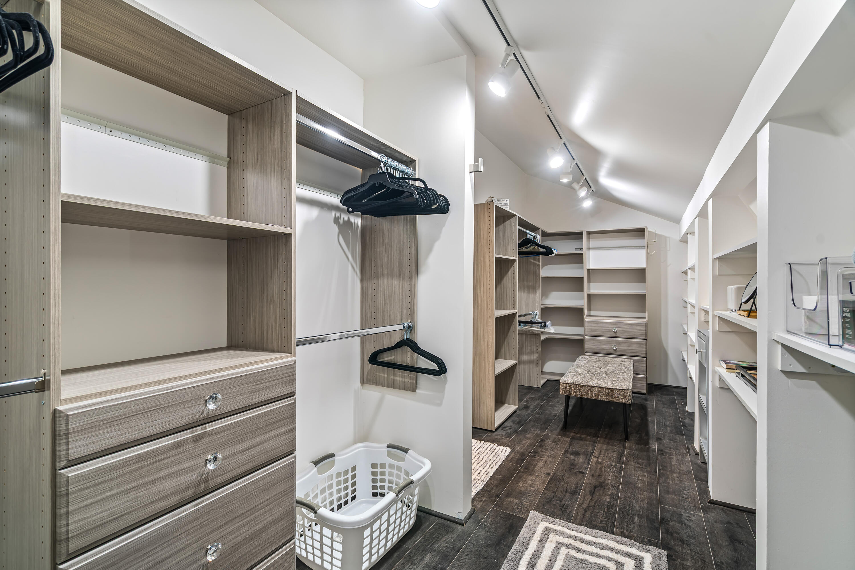 76632 Morocco Road Palm Desert, CA 92211 - Photo 19 of 38 a view of walk in closet with clothes and shoes