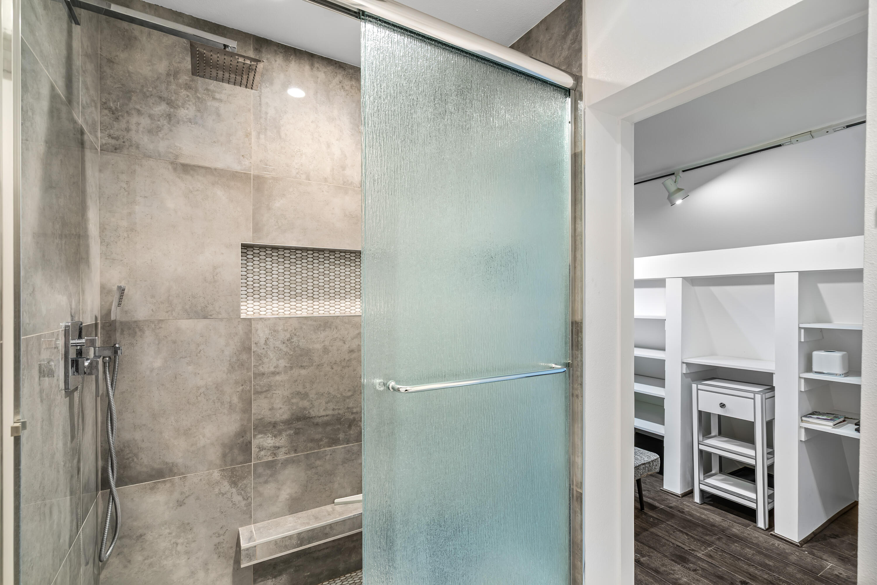 76632 Morocco Road Palm Desert, CA 92211 - Photo 21 of 38 a bathroom with a glass shower door