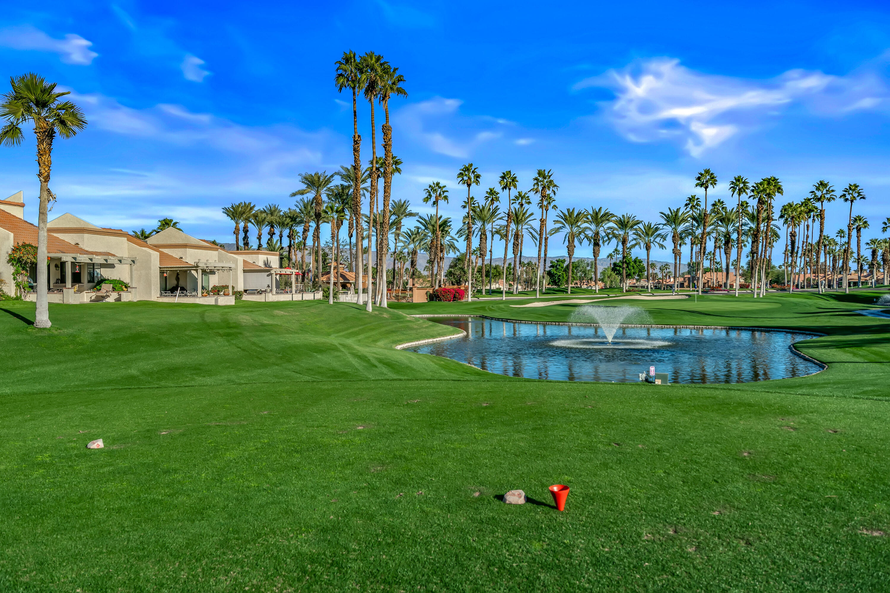 76632 Morocco Road Palm Desert, CA 92211 - Photo 24 of 38 a view of a park with a house in the background