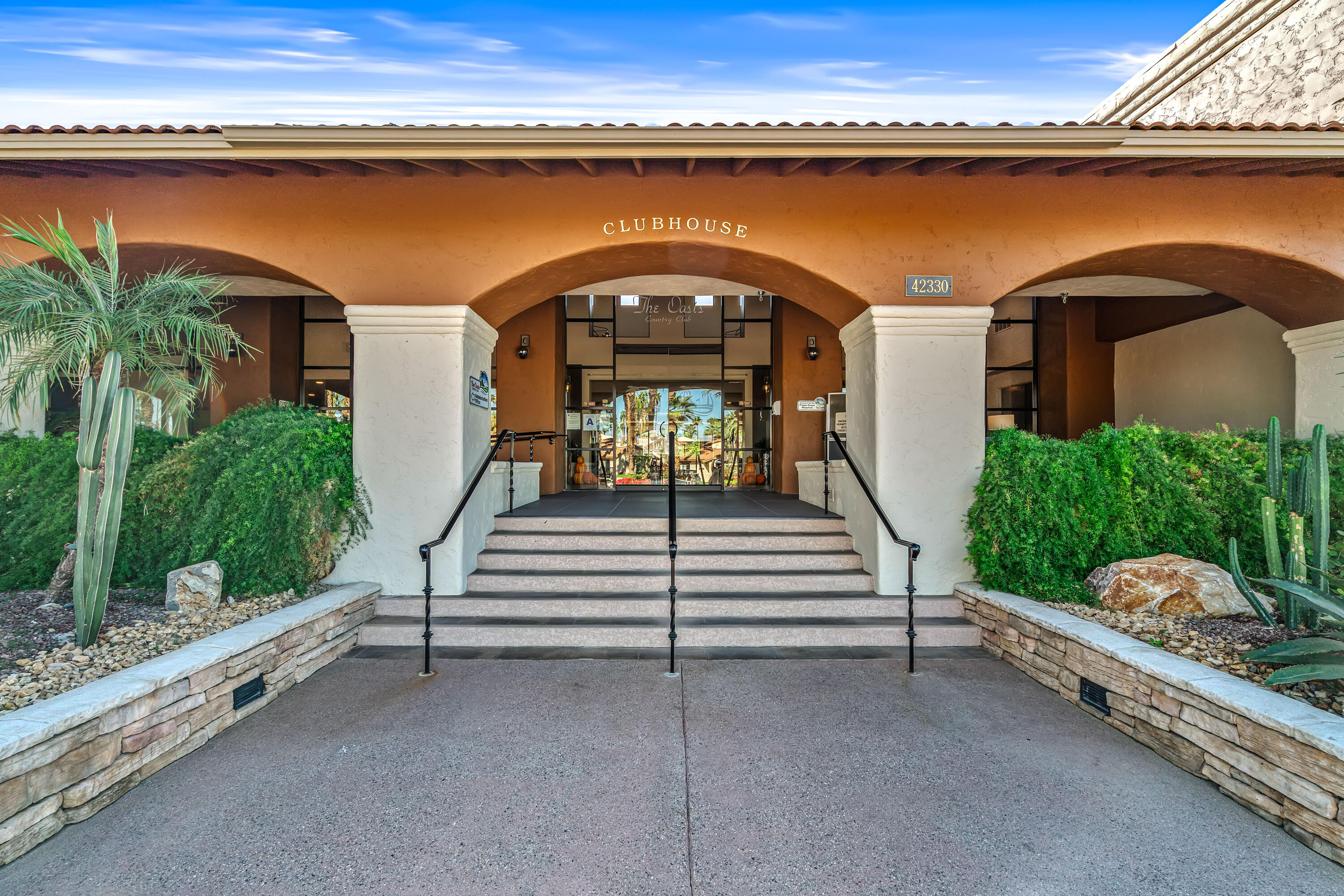 76632 Morocco Road Palm Desert, CA 92211 - Photo 28 of 38 a view of entryway with a garden