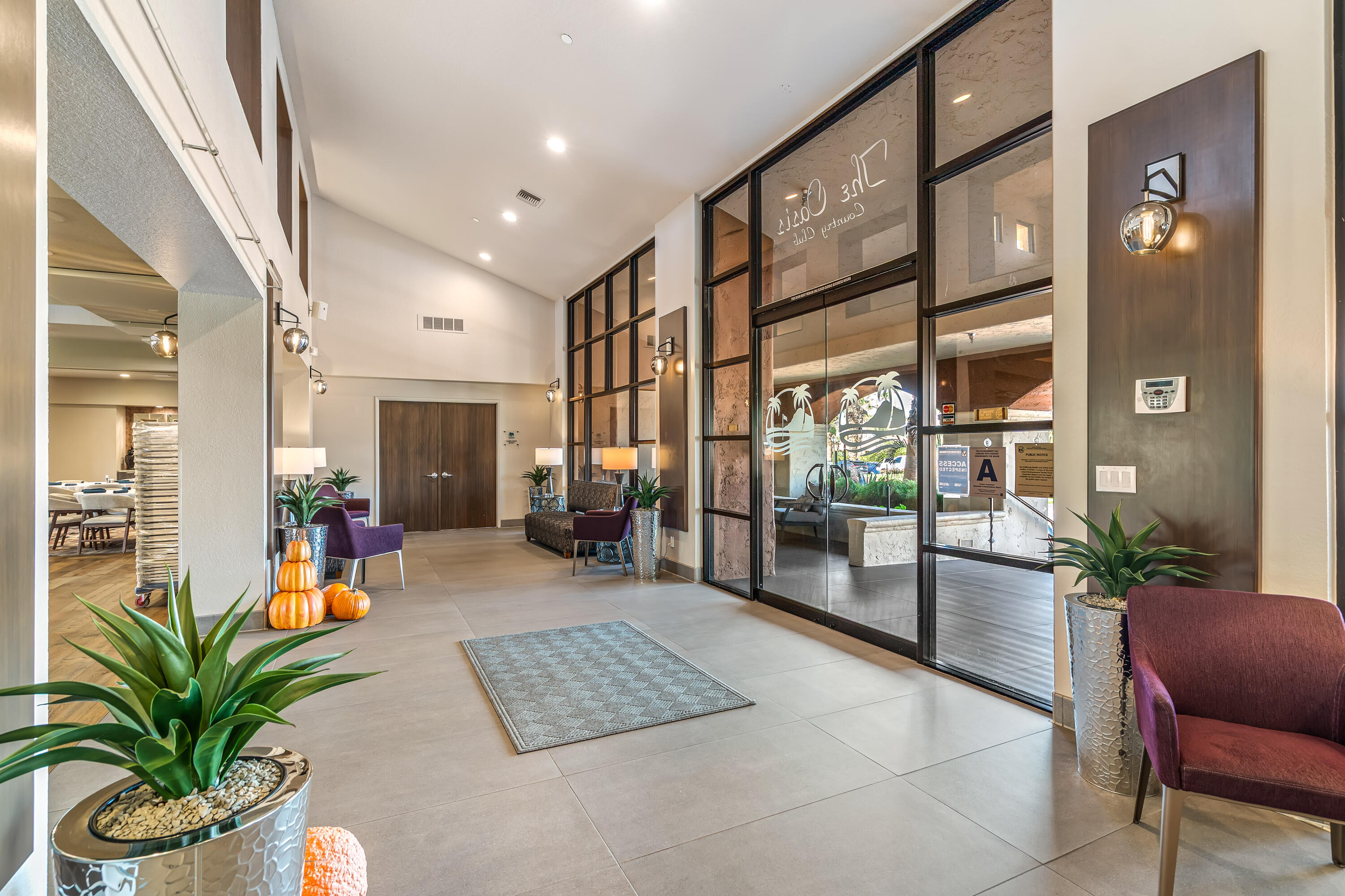 76632 Morocco Road Palm Desert, CA 92211 - Photo 38 of 38 a lobby with furniture and a potted plant