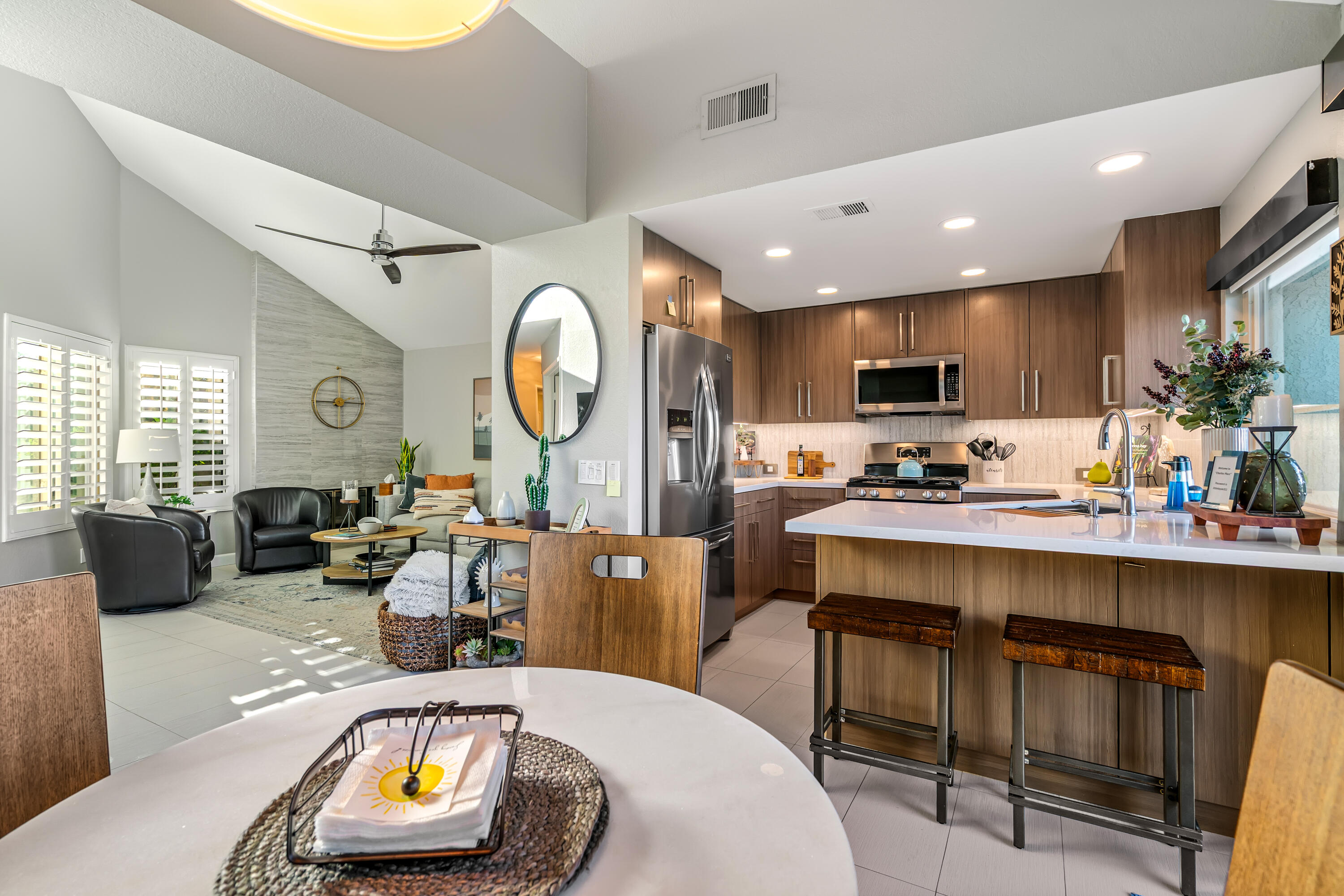 76632 Morocco Road Palm Desert, CA 92211 - Photo 7 of 38 a living room with fireplace furniture and a wooden floor