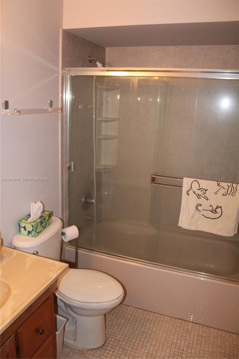 12965 Southwest 76th Terrace Miami, FL 33183 - Photo 21 of 29 a bathroom with a sink a toilet and shower