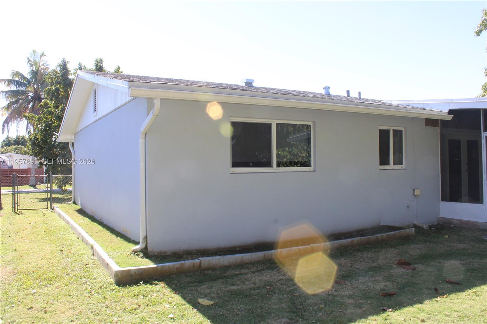 12965 Southwest 76th Terrace Miami, FL 33183 - Photo 5 of 29 a view of a backyard