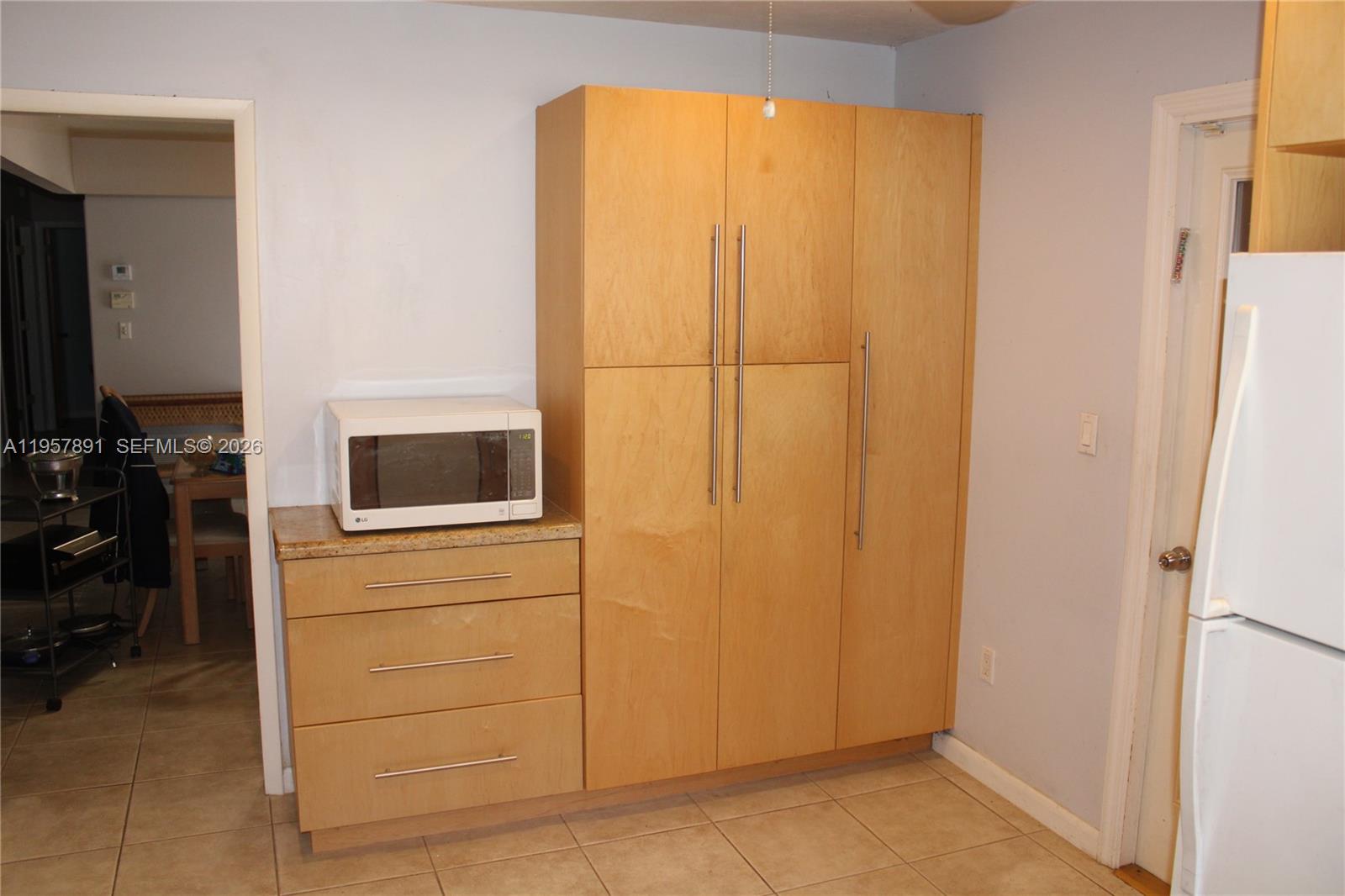 12965 Southwest 76th Terrace Miami, FL 33183 - Photo 9 of 29 a bathroom with a shower and a sink