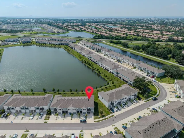 a view of a city and lake