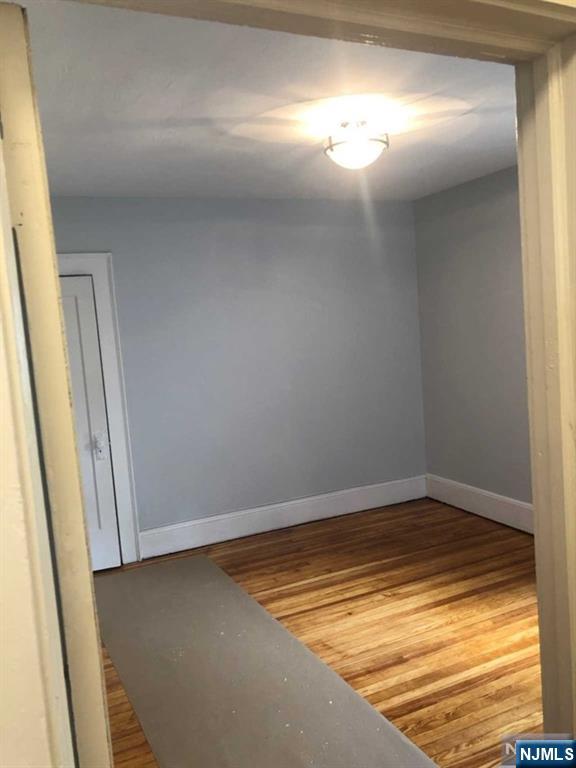 15 East Van Ness Avenue, Unit 1 Rutherford, NJ 07070 - Photo 15 of 25 a view of empty room with window