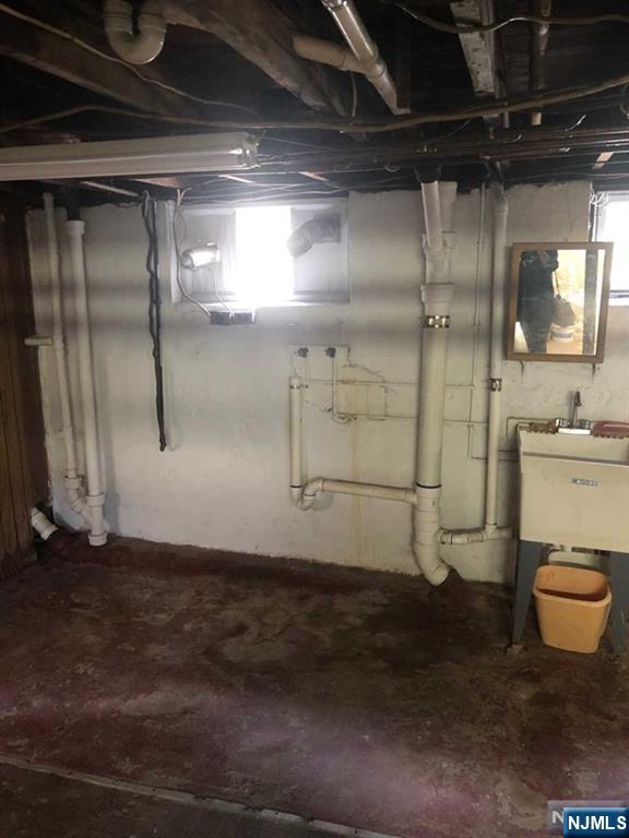 15 East Van Ness Avenue, Unit 1 Rutherford, NJ 07070 - Photo 22 of 25 a bathroom with a shower