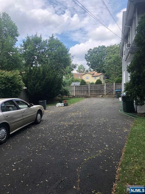 15 East Van Ness Avenue, Unit 1 Rutherford, NJ 07070 - Photo 23 of 25 a view of a car parked in front of a house