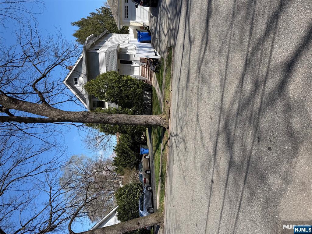 15 East Van Ness Avenue, Unit 1 Rutherford, NJ 07070 - Photo 24 of 25 a view of a house with a patio