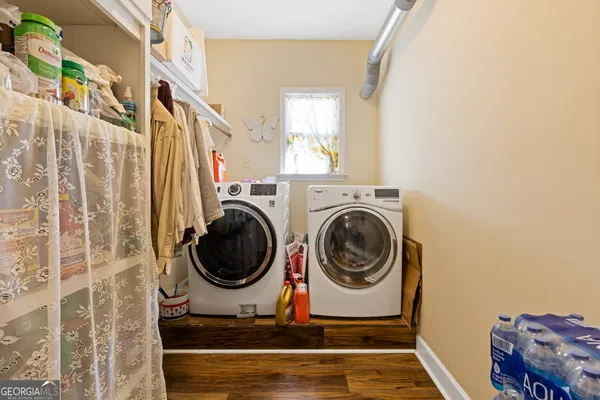 a utility room with dryer and washer