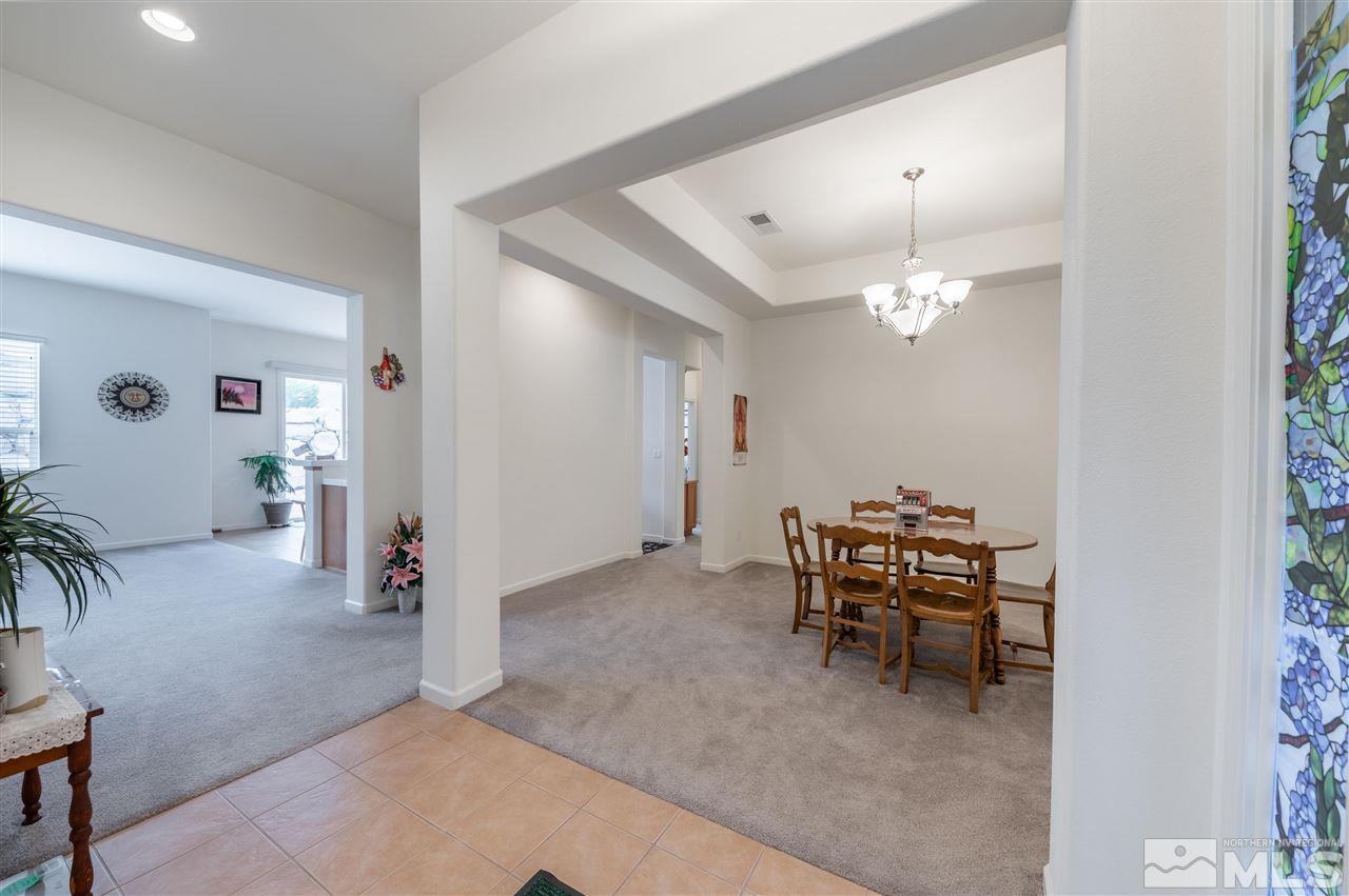 1065 South University Park Loop Reno, NV 89512 - Photo 2 of 20 a view of a livingroom with furniture and a livingroom