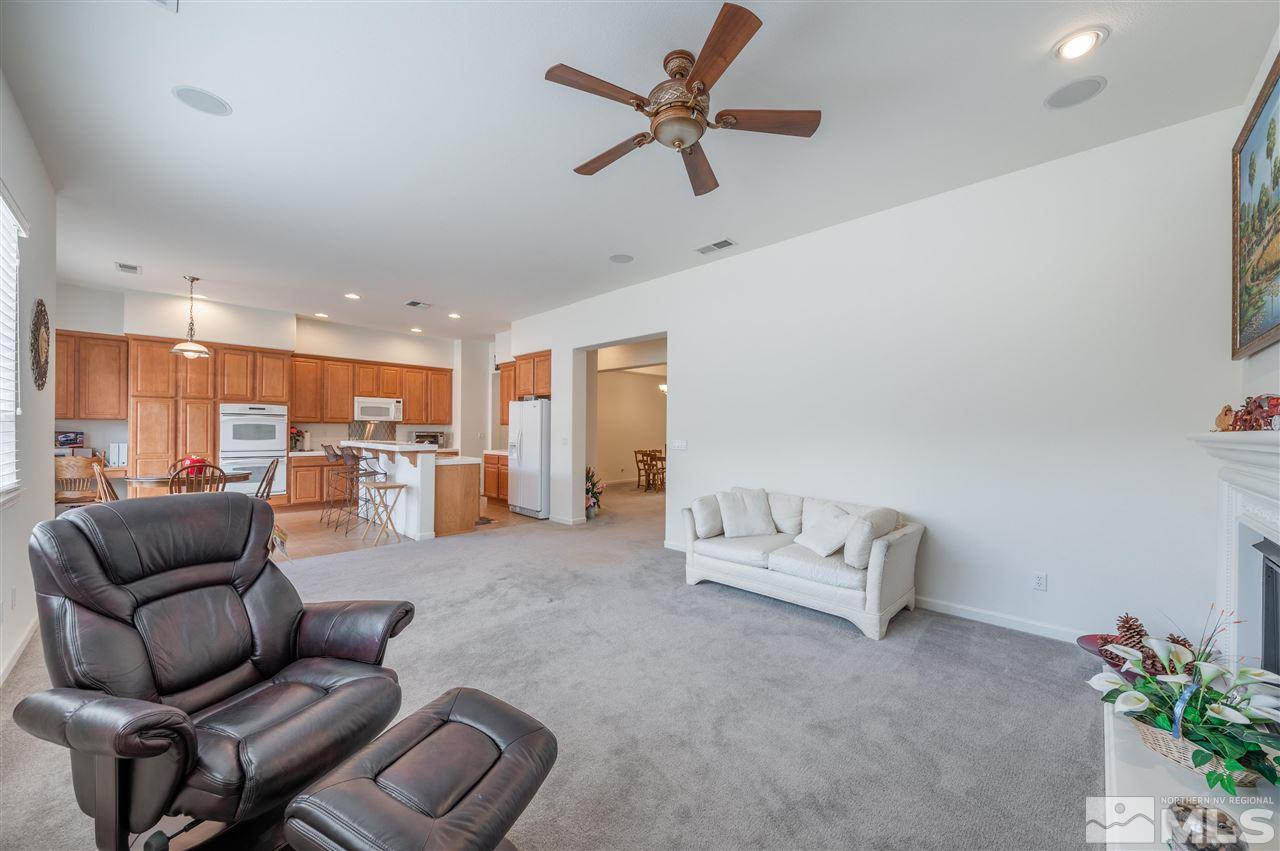 1065 South University Park Loop Reno, NV 89512 - Photo 5 of 20 a living room with furniture and kitchen view