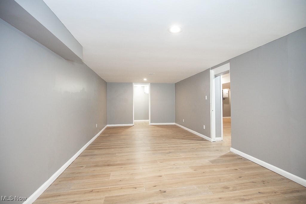 1547 Genesee Road South Euclid, OH 44121 - Photo 25 of 36 Spare room featuring baseboards, recessed lighting, and light wood-style floors