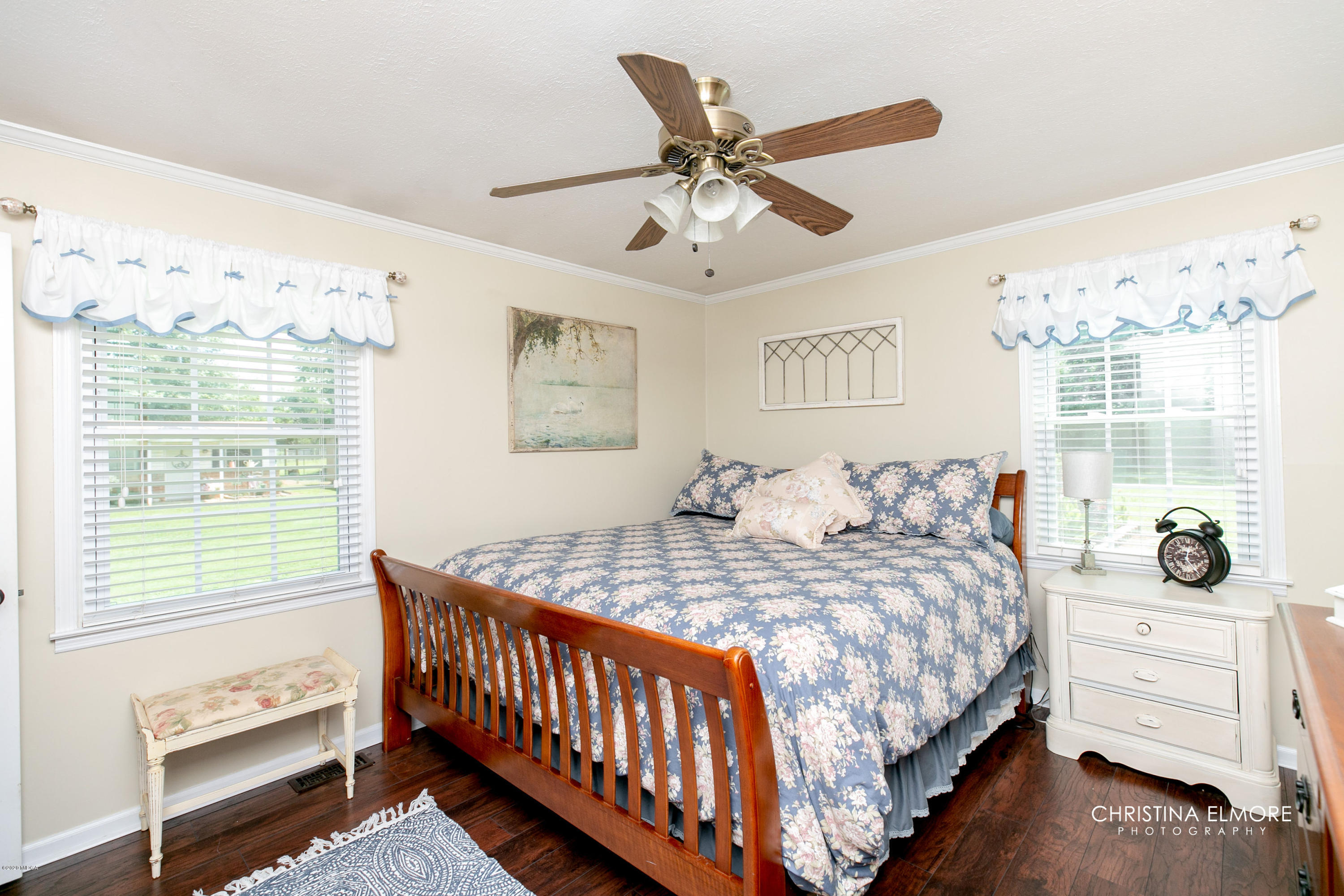 3673 Jones Road Macon, GA 31216 - Photo 19 of 34 a bedroom with a bed a window and dresser
