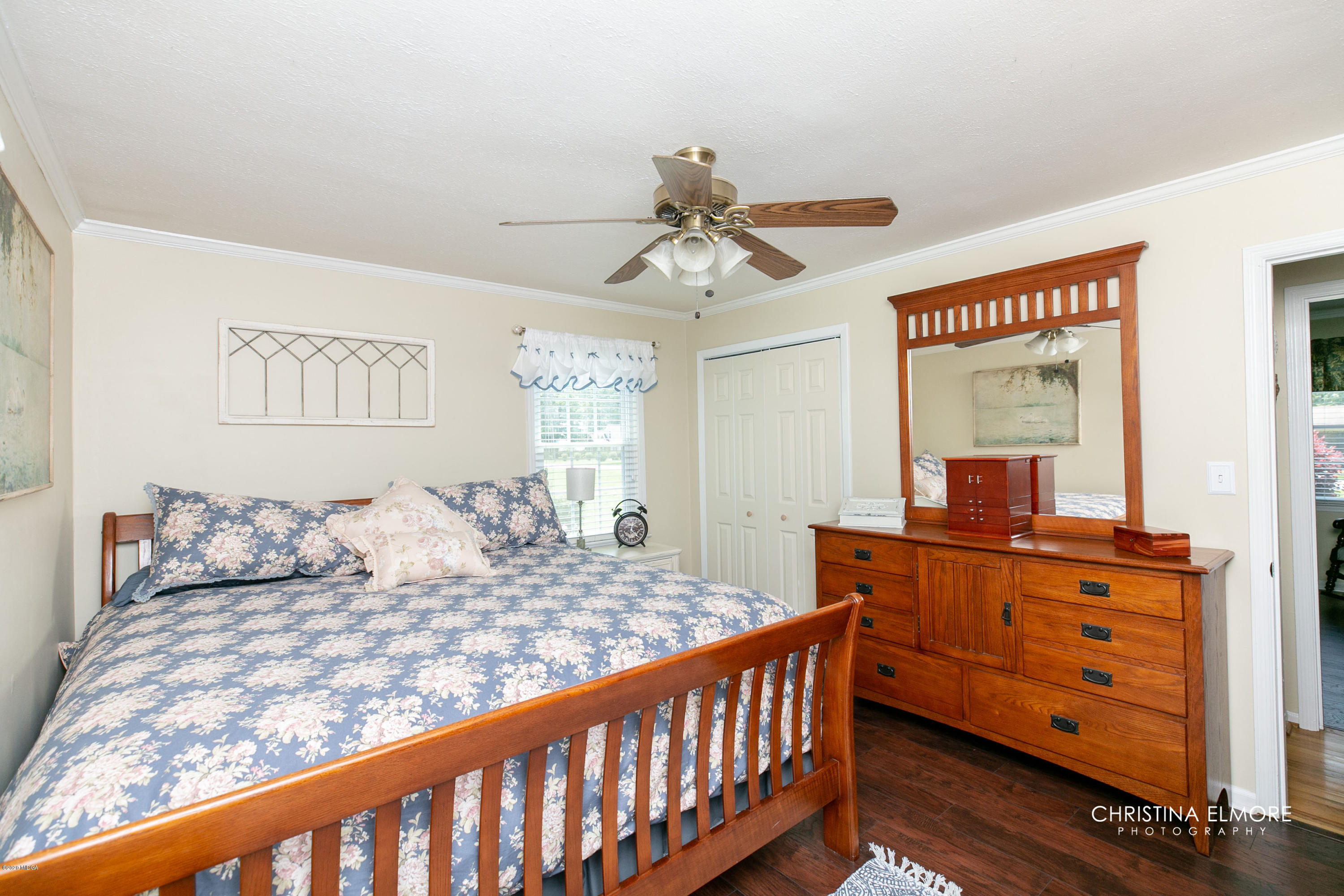3673 Jones Road Macon, GA 31216 - Photo 21 of 34 a bedroom with a bed and a dresser in it