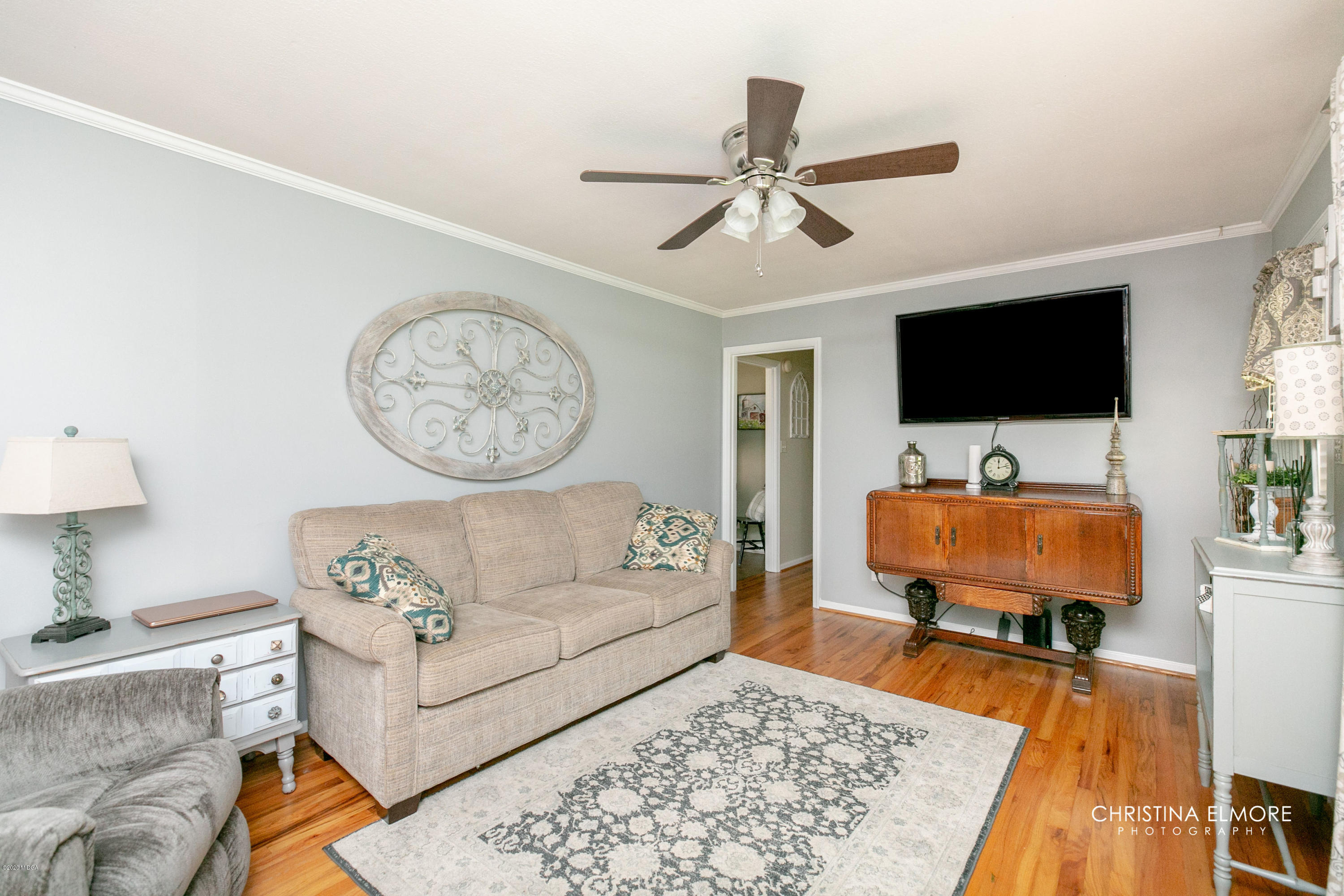 3673 Jones Road Macon, GA 31216 - Photo 6 of 34 a living room with furniture and a flat screen tv