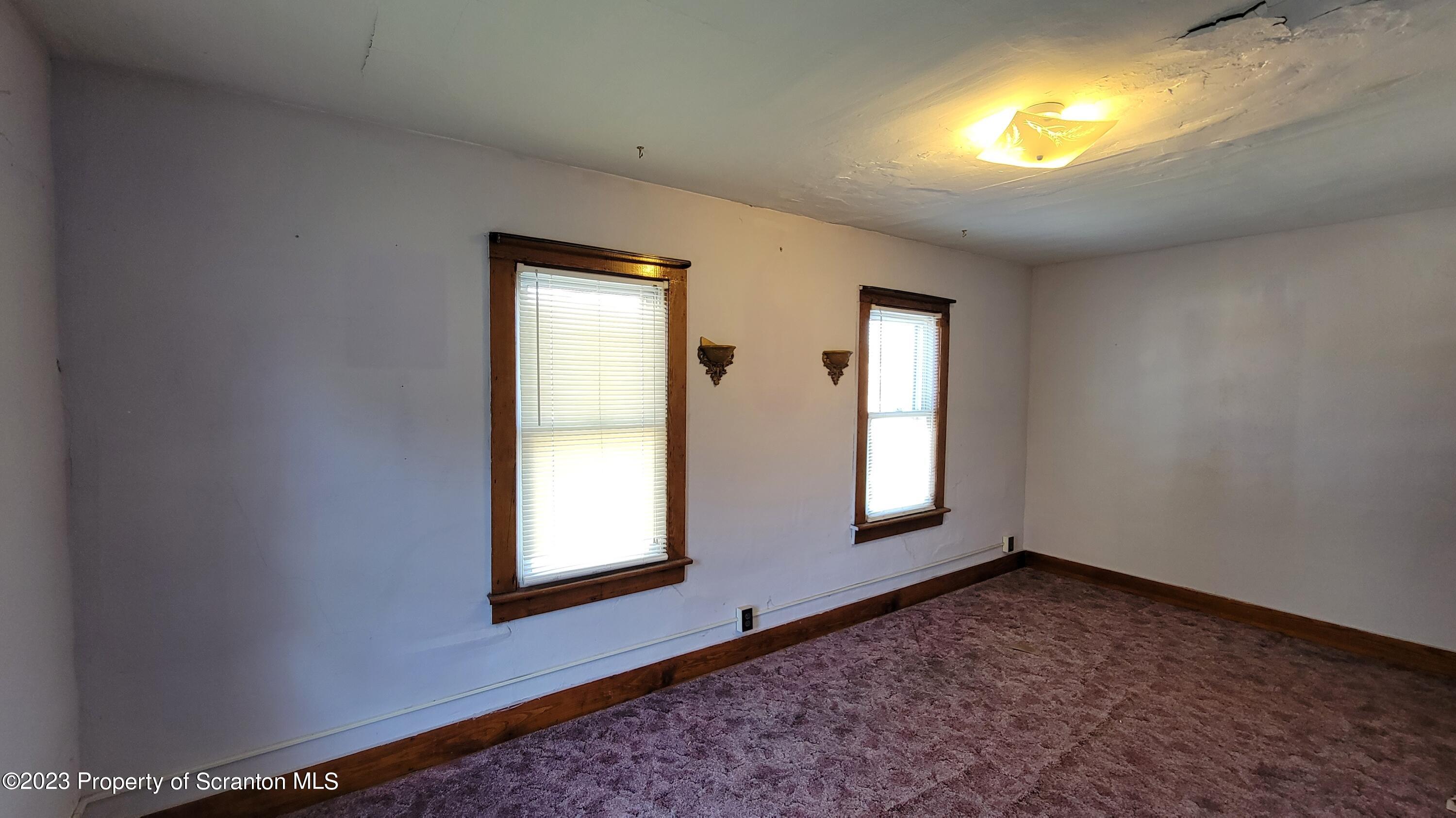 232 Vine Street Forest City, PA 18421 - Photo 14 of 24 a view of empty room with window