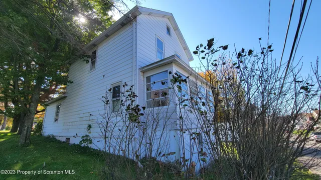 a view of a house with a plants