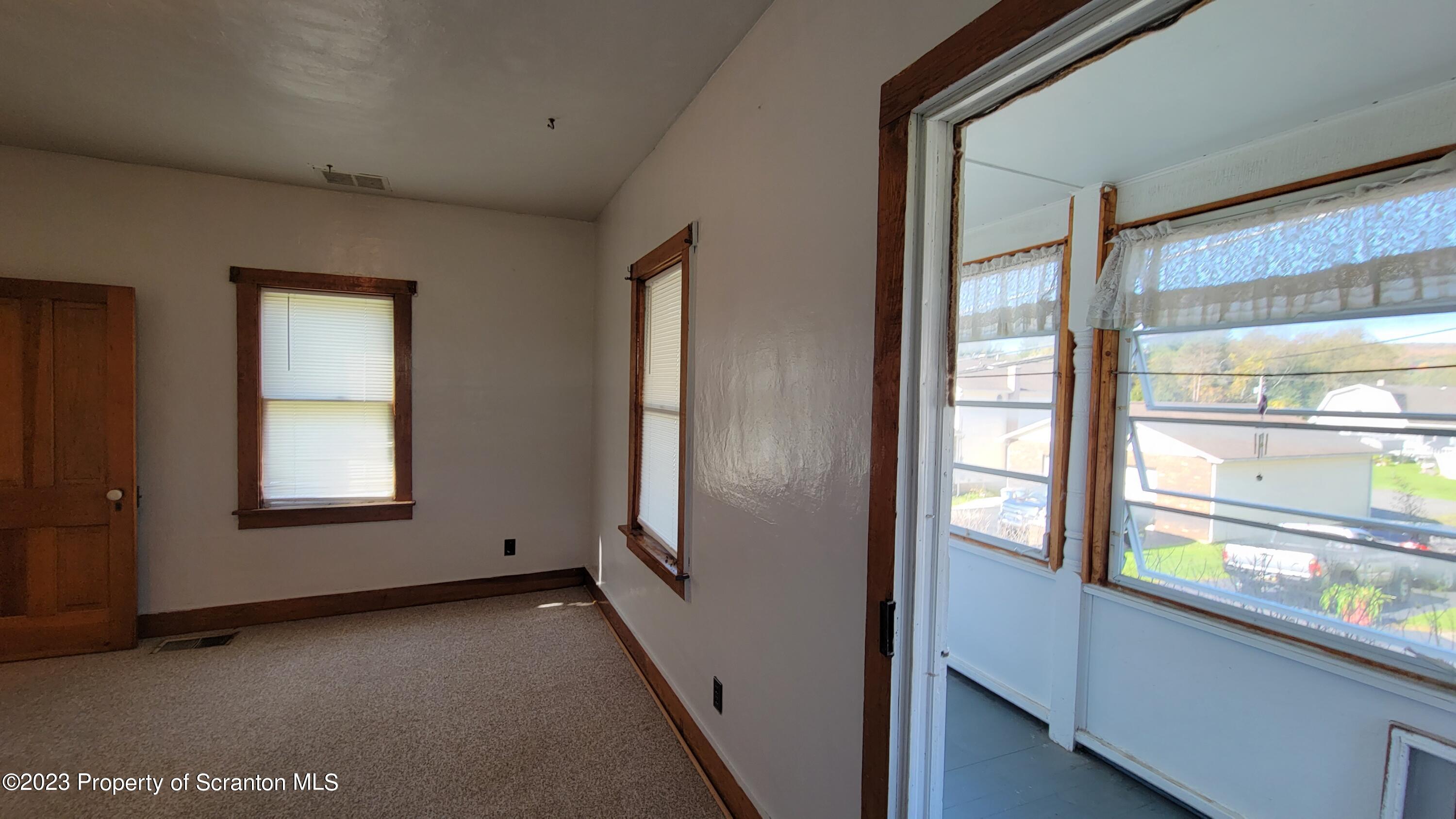 232 Vine Street Forest City, PA 18421 - Photo 23 of 24 a view of empty room with windows