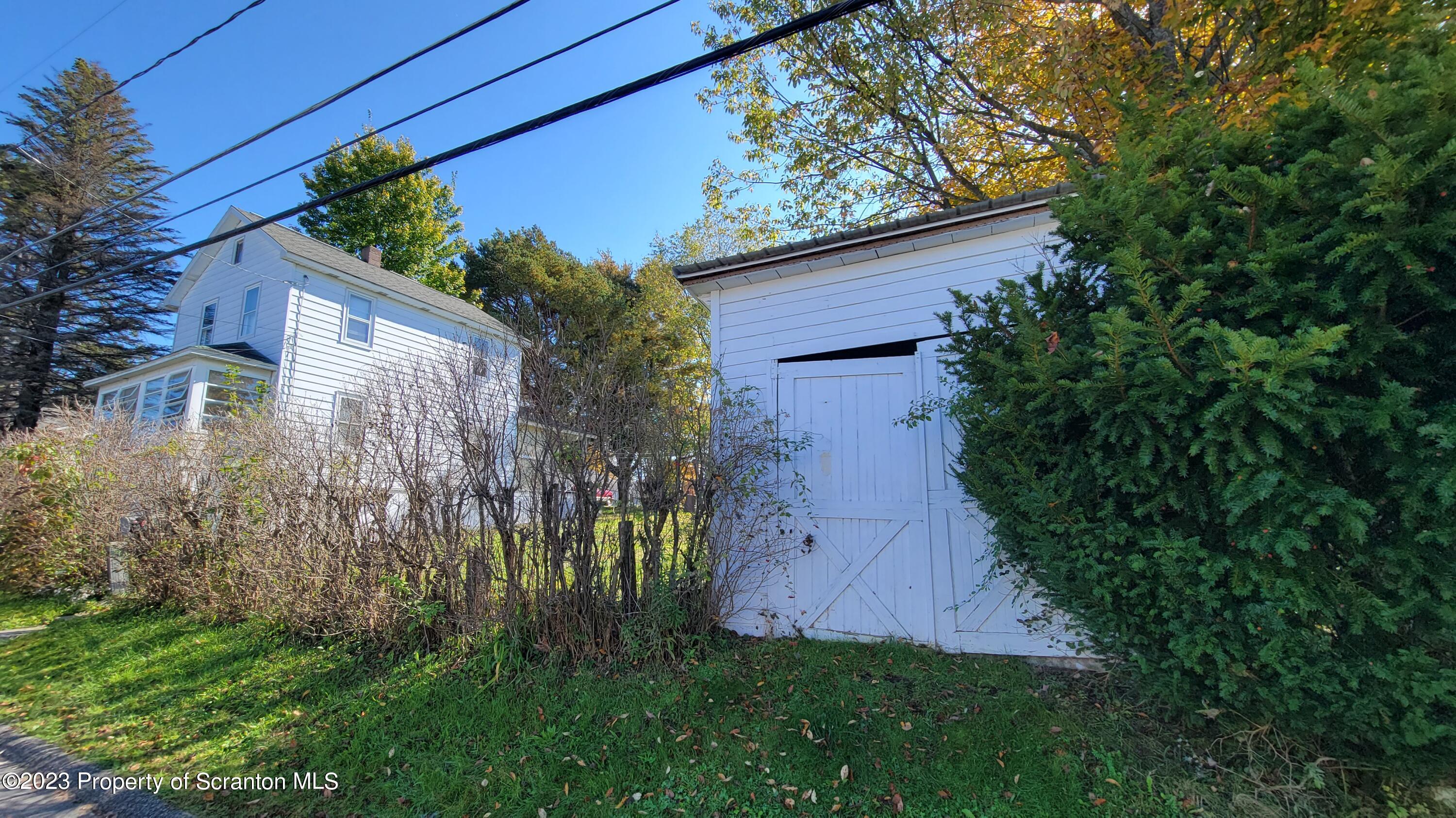 232 Vine Street Forest City, PA 18421 - Photo 9 of 24 a view of a backyard with plants