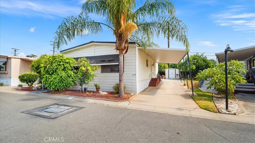 416 Jeffries, Unit 5 Monrovia, CA 91016 - Photo 1 of 20 front view of a house with a garden