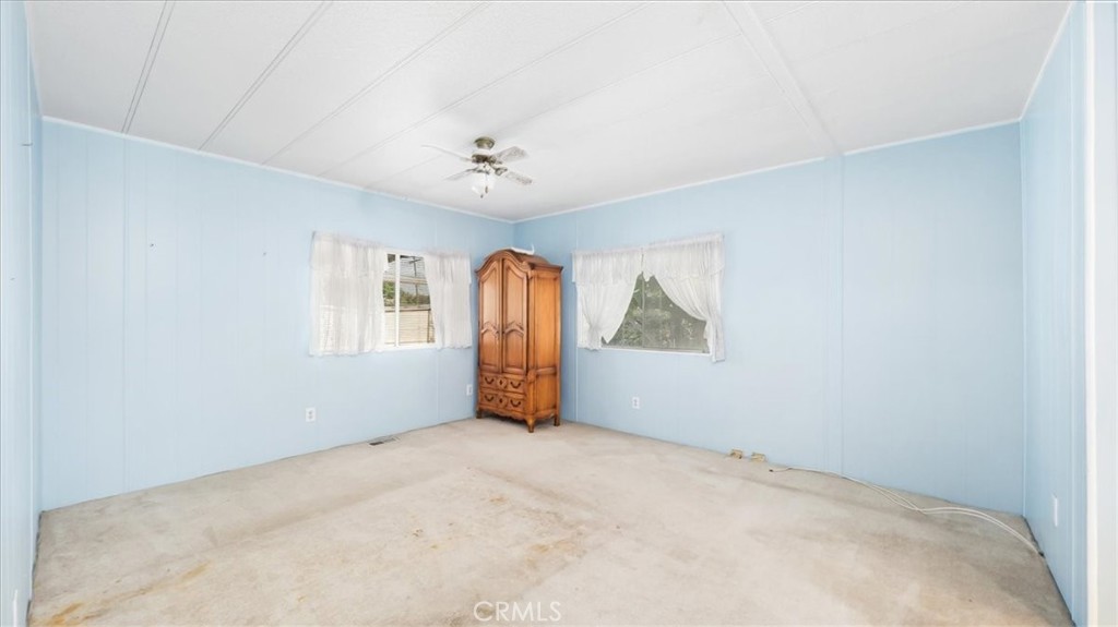 416 Jeffries, Unit 5 Monrovia, CA 91016 - Photo 12 of 20 a view of a big room with windows and chandelier fan